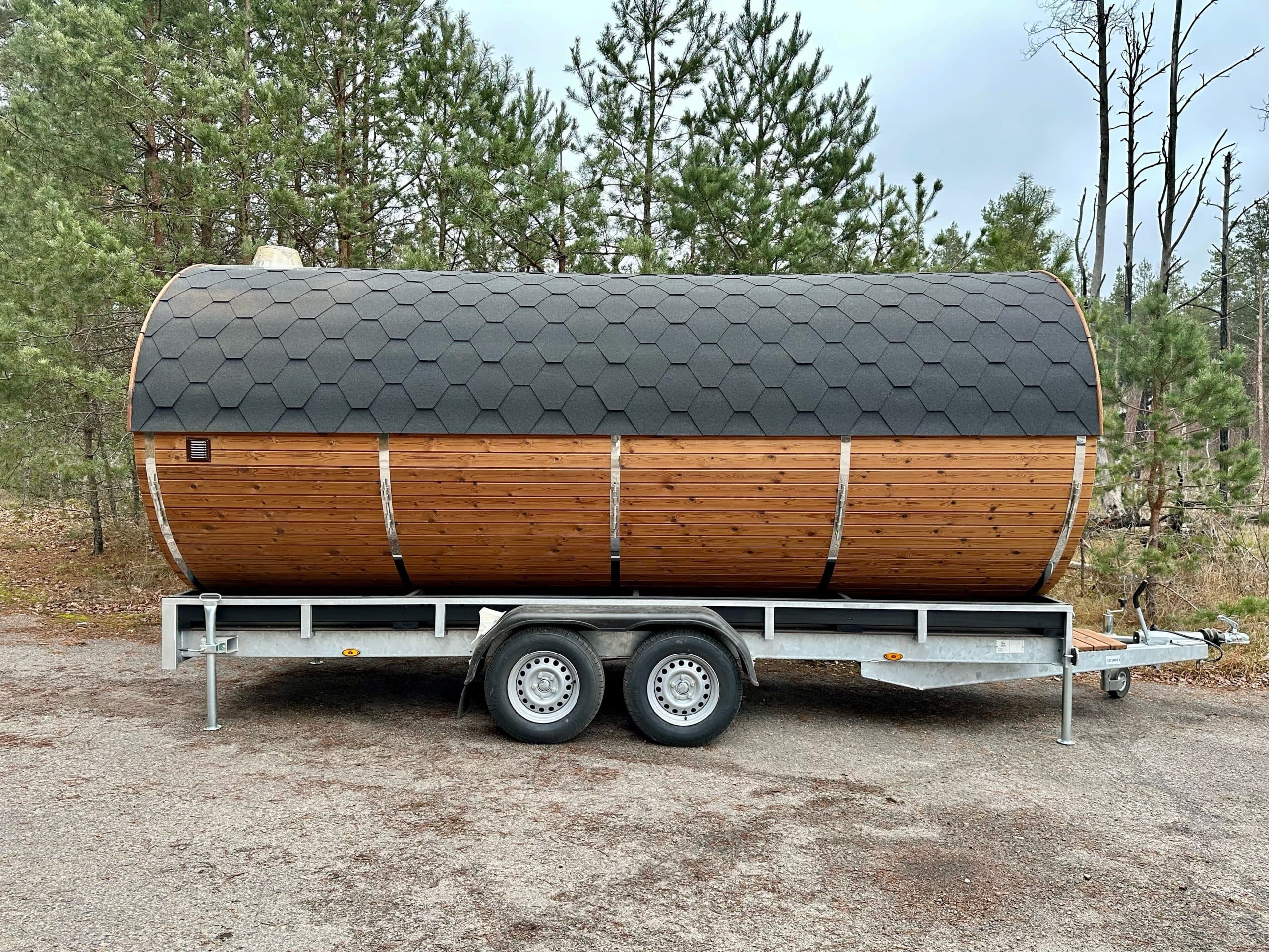 Bespoke barrel mobile sauna trailer in thermowood, built in Britain